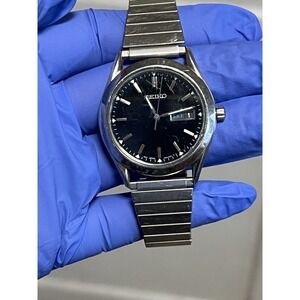 Seiko 7N43-9070 Quartz Day Date Black Dial Stainless Mens Watch Working Tested